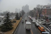 Китайская столица покрыта льдом и туманом