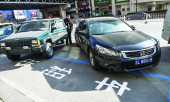 Таксисты Пекина борются за место под солнцем
