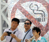 Опыт Пекина по запрету курения распространят по всему Китаю