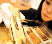 За праздничную неделю в Пекине продано 1,5 т золота