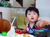 Упавшая с 10-го этажа китайская девочка вышла из комы