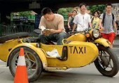 Пекинские таксисты берут самую низкую оплату за проезд